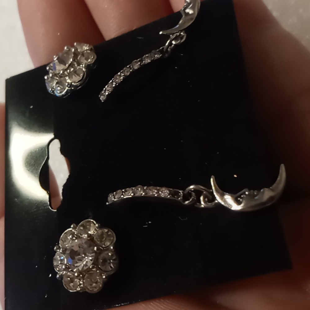 Dangling moons drop earrings with a cluster crystal stud earring.